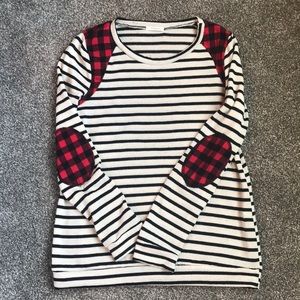 Cream and black striped sweater.
